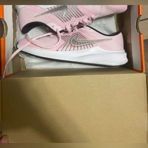 Pink Nike running shoes sneakers